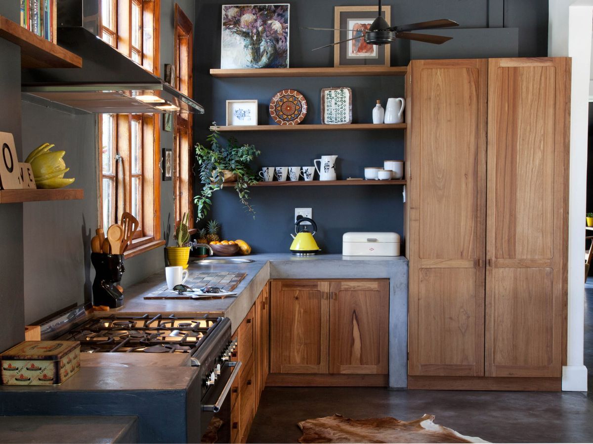 Contemporary kitchen with concrete countertops.