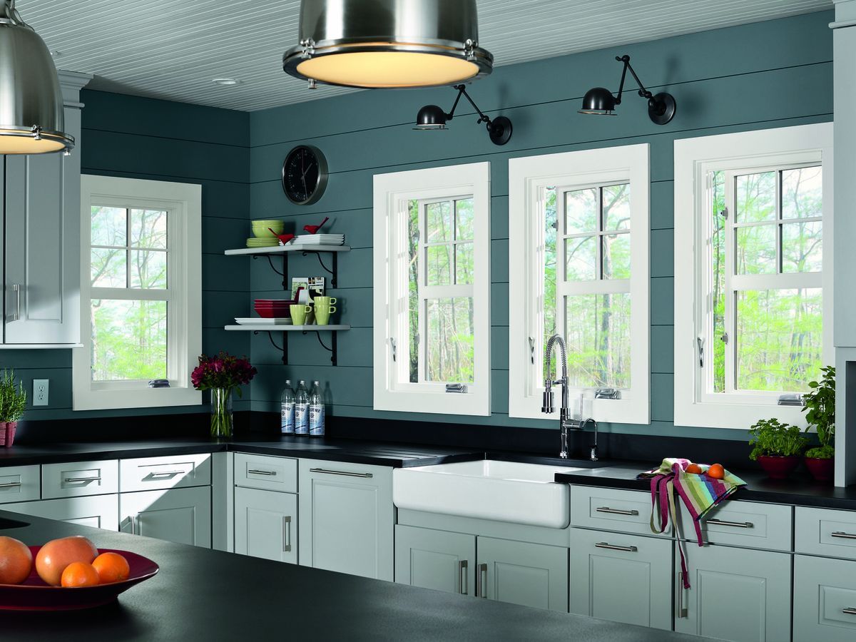 Image of a home with double hung windows. It is important to choose the right window types for your home.
